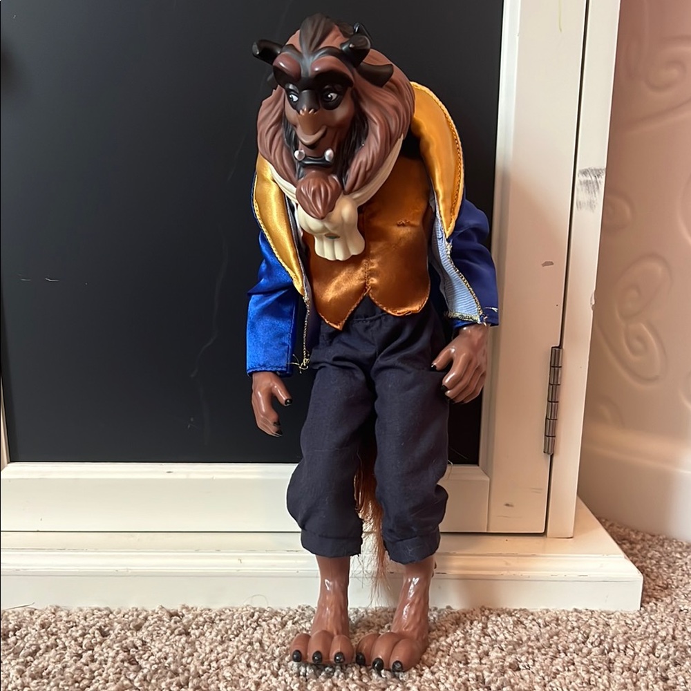 Beast Figurine with Blue and Gold Outfit